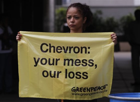 Greenpeace activists protested outside Chevron's offices in Rio de Janeiro, Brazil, on Friday.